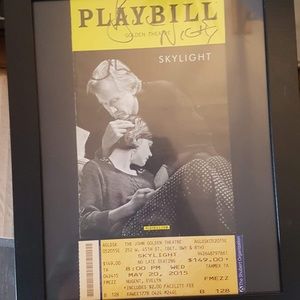 Four framed playbills some signed